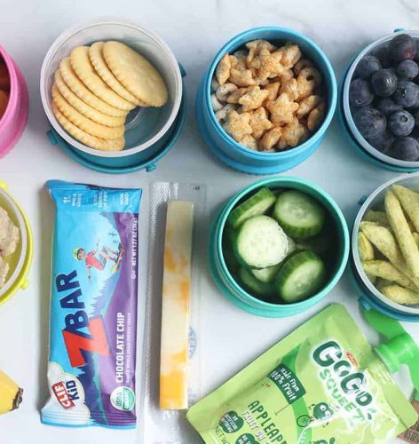 preschool snacks in containers on countertop